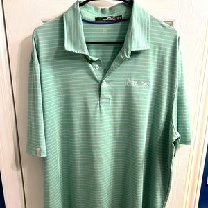 Pristine RLX polo. Signature loop label and embroidered logo. Size XL